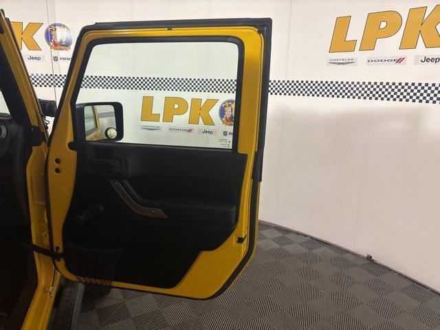 used 2015 Jeep Wrangler Unlimited car, priced at $13,994