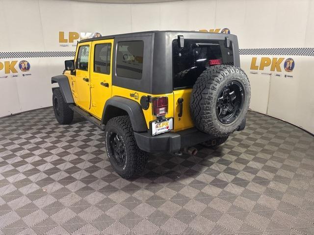 used 2015 Jeep Wrangler Unlimited car, priced at $13,994