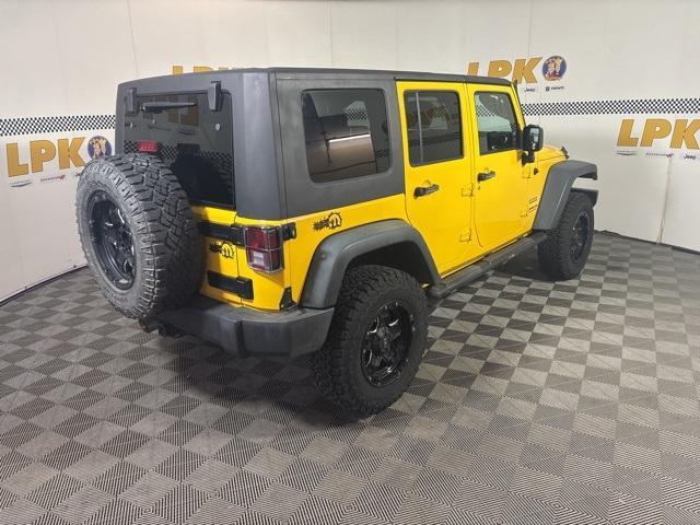 used 2015 Jeep Wrangler Unlimited car, priced at $13,994
