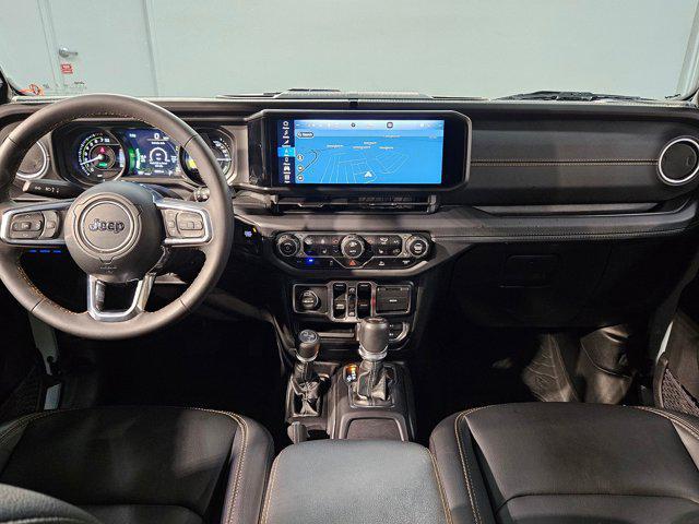 used 2024 Jeep Wrangler 4xe car, priced at $35,629