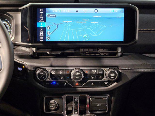 used 2024 Jeep Wrangler 4xe car, priced at $35,629