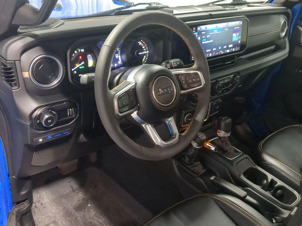 used 2024 Jeep Wrangler 4xe car, priced at $31,295