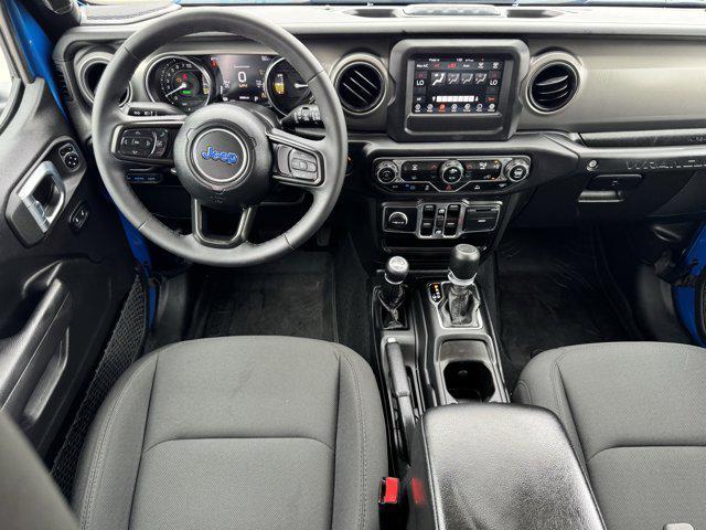 used 2023 Jeep Wrangler 4xe car, priced at $26,724