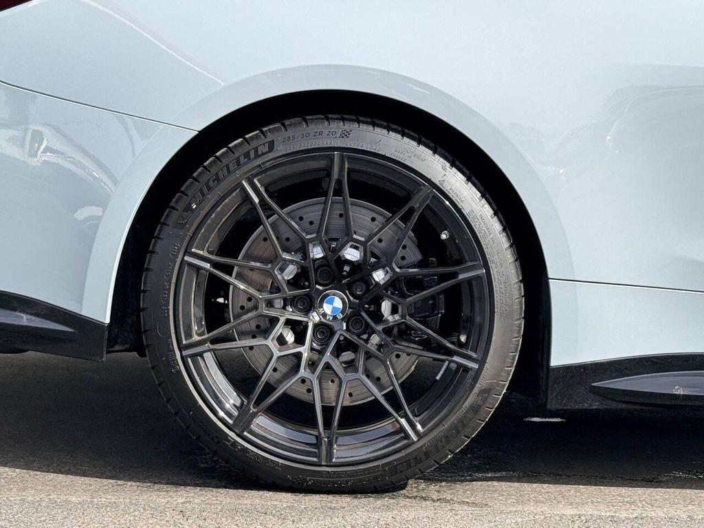used 2024 BMW M4 car, priced at $77,999