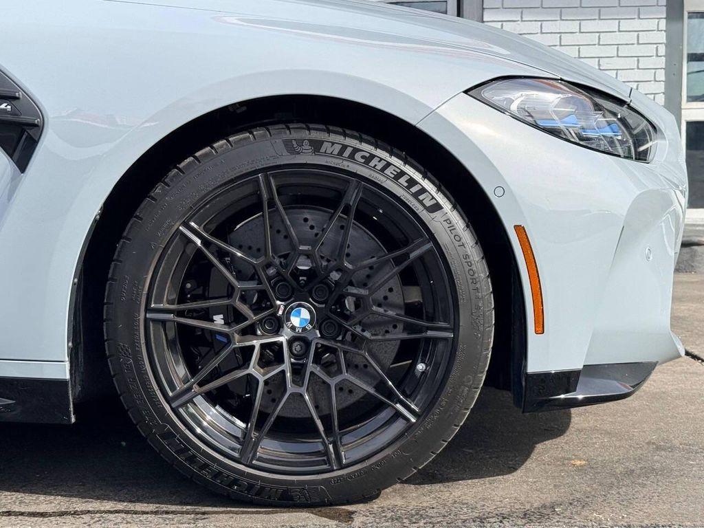 used 2024 BMW M4 car, priced at $77,999