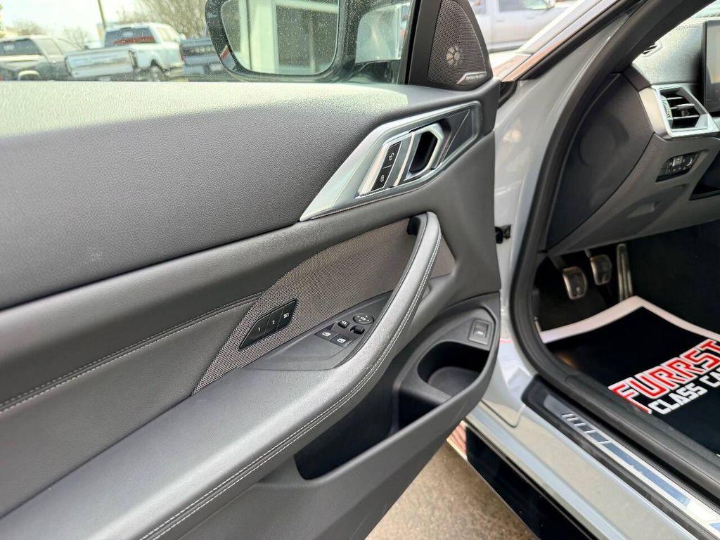 used 2024 BMW M4 car, priced at $77,999