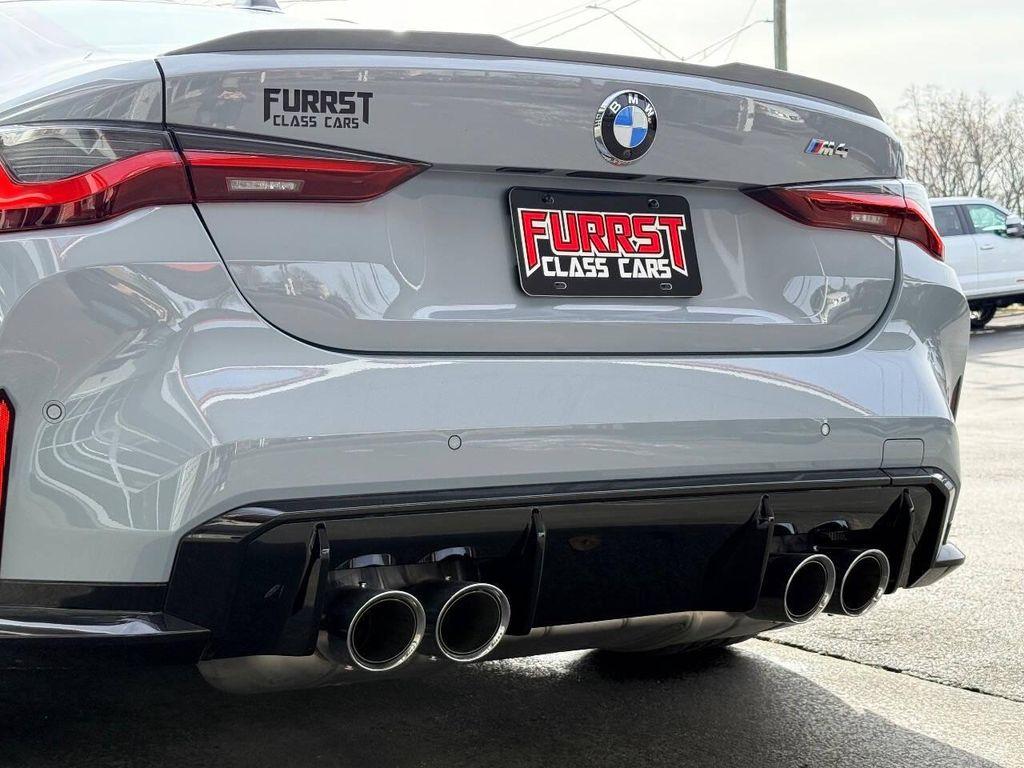 used 2024 BMW M4 car, priced at $77,999