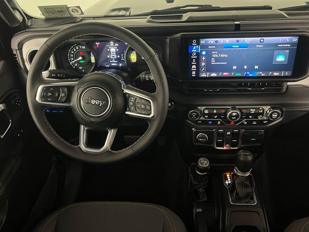 used 2025 Jeep Wrangler 4xe car, priced at $30,973
