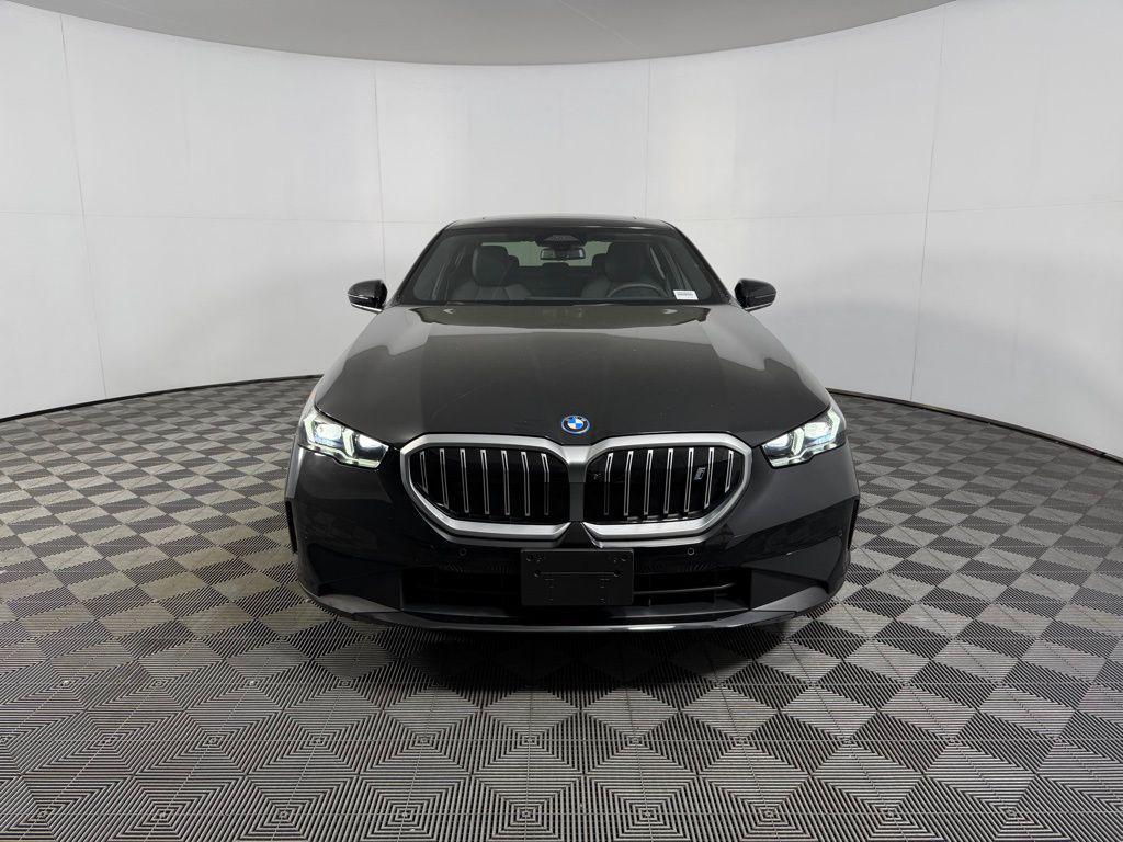 used 2025 BMW i5 car, priced at $52,573