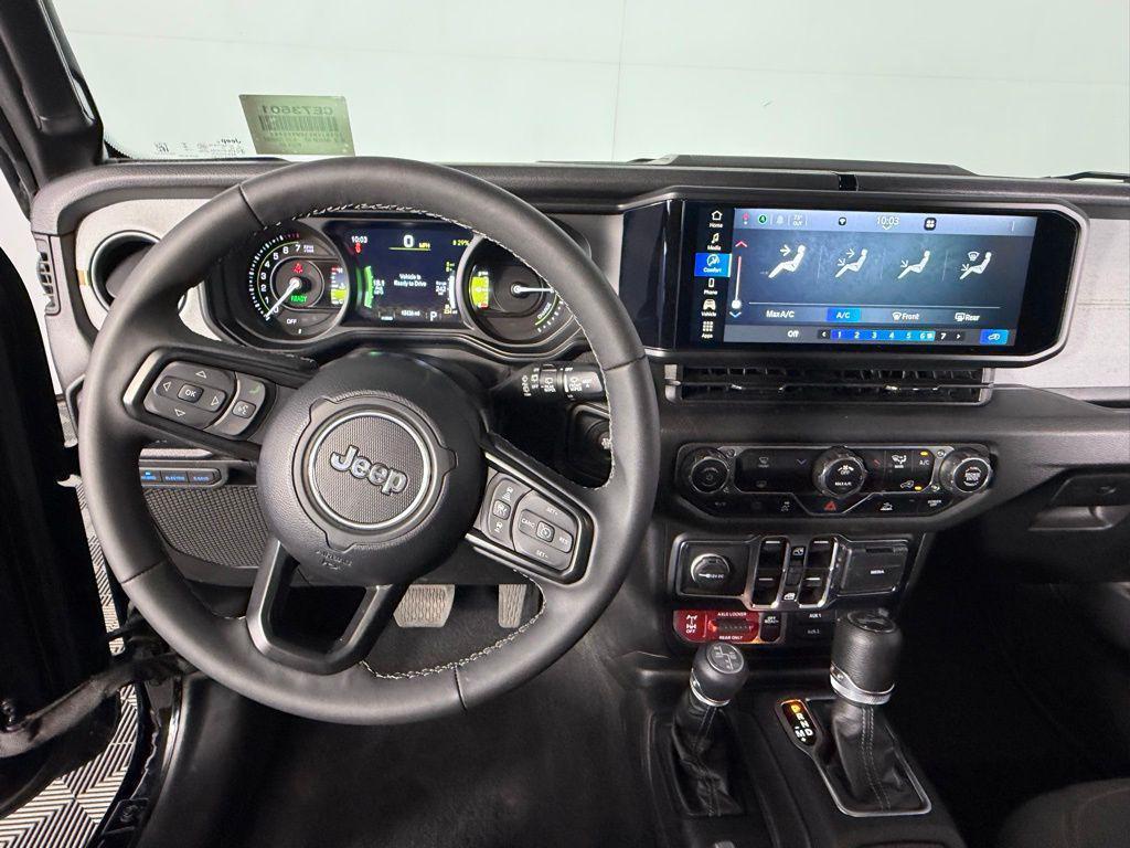 used 2025 Jeep Wrangler 4xe car, priced at $30,073