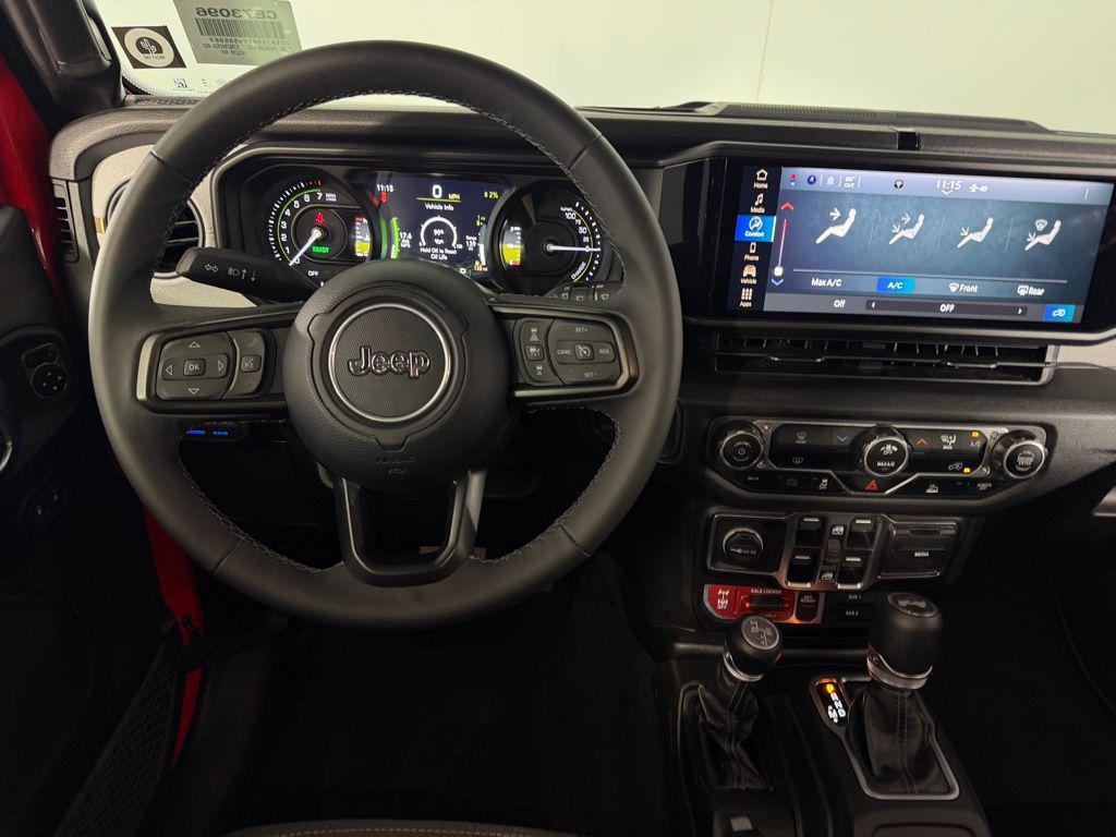 used 2025 Jeep Wrangler 4xe car, priced at $30,773
