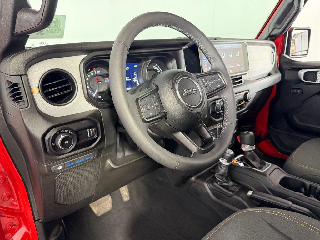 used 2025 Jeep Wrangler 4xe car, priced at $30,773