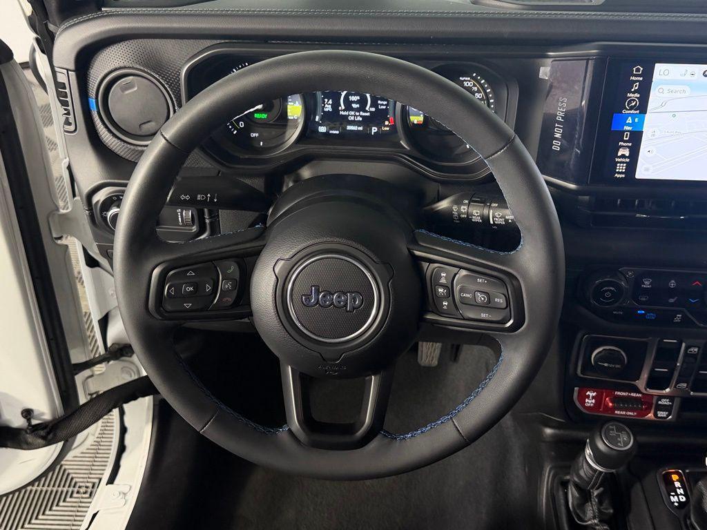 used 2024 Jeep Wrangler 4xe car, priced at $34,674