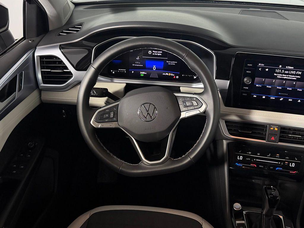 used 2025 Volkswagen Taos car, priced at $24,774