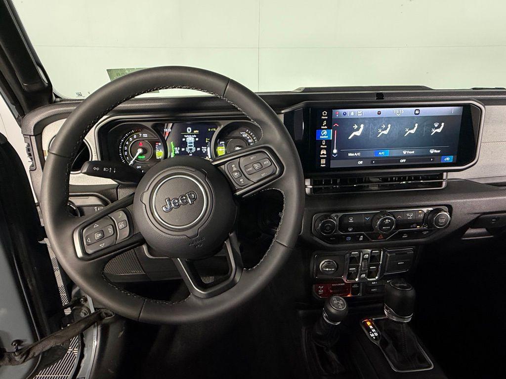 used 2025 Jeep Wrangler 4xe car, priced at $30,972