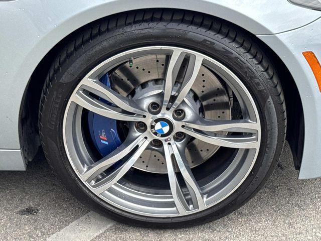 used 2014 BMW M5 car, priced at $25,800