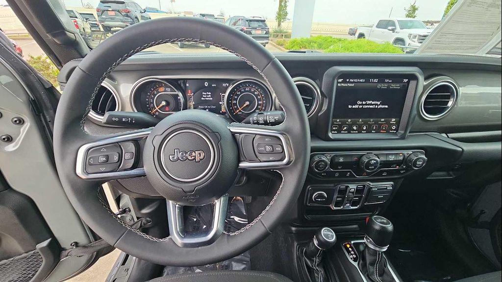 used 2023 Jeep Wrangler car, priced at $34,599