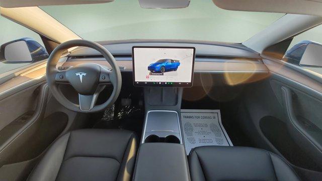 used 2023 Tesla Model Y car, priced at $32,882