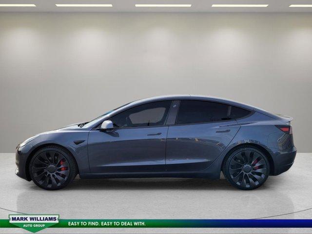 used 2022 Tesla Model 3 car, priced at $28,650