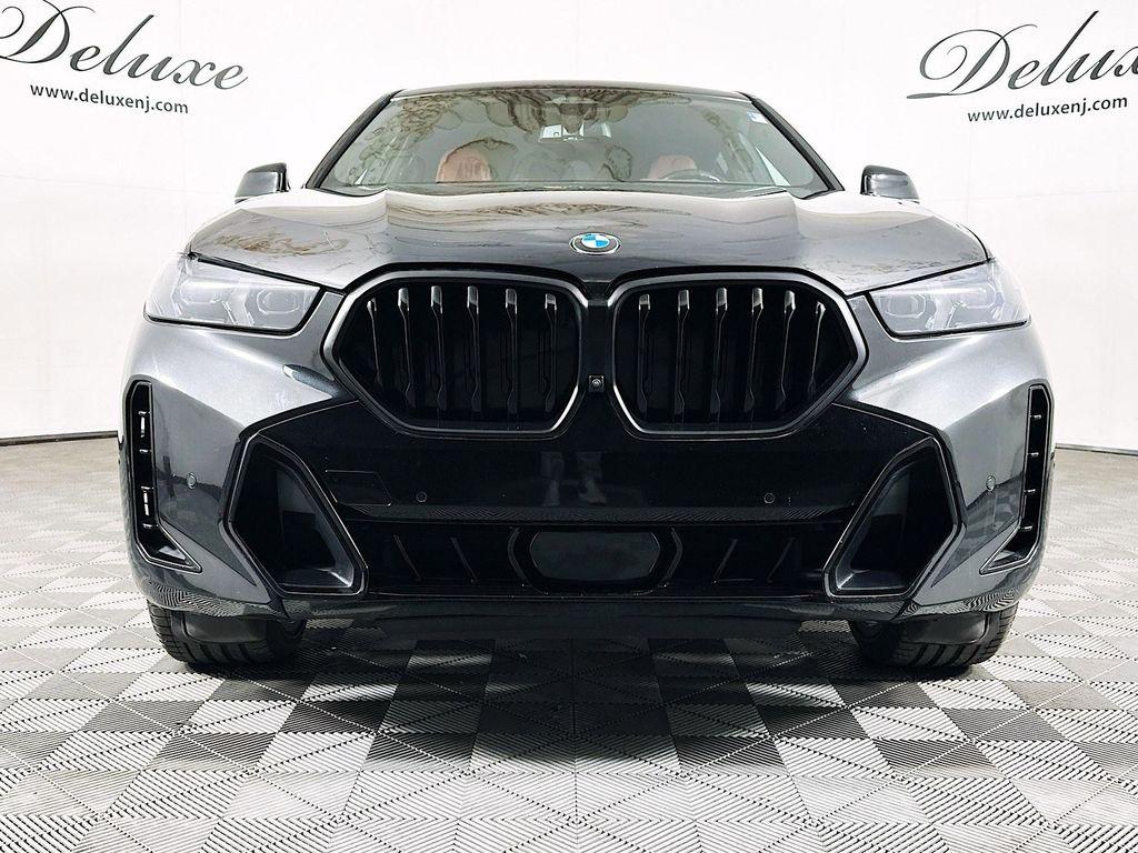 used 2024 BMW X6 car, priced at $65,737