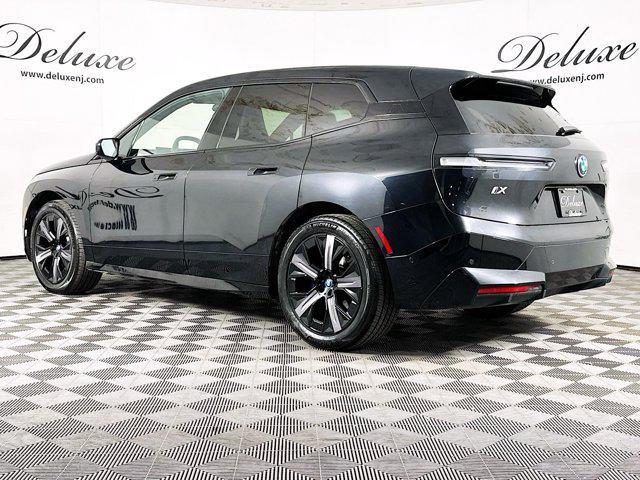 used 2024 BMW iX car, priced at $49,737