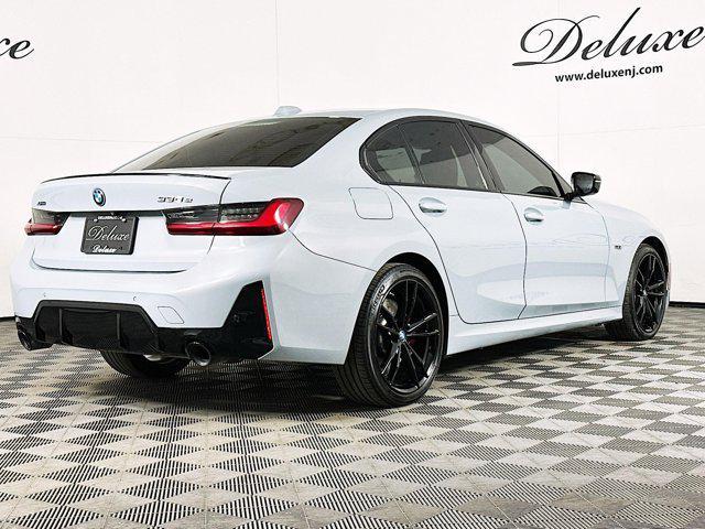 used 2023 BMW 330e car, priced at $34,839