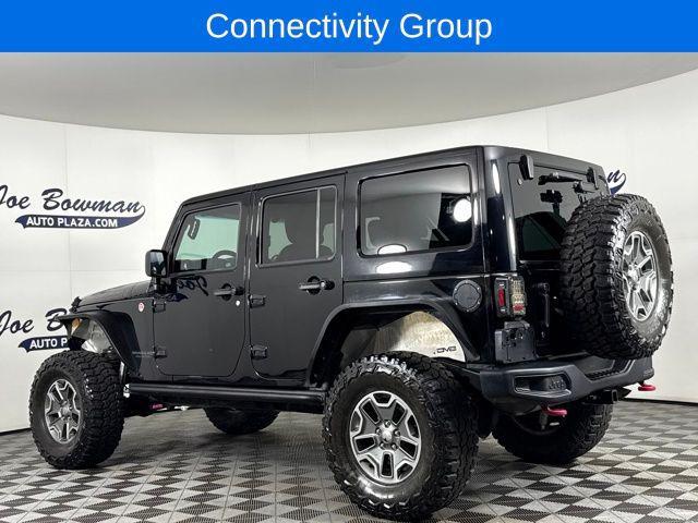 used 2015 Jeep Wrangler Unlimited car, priced at $21,660