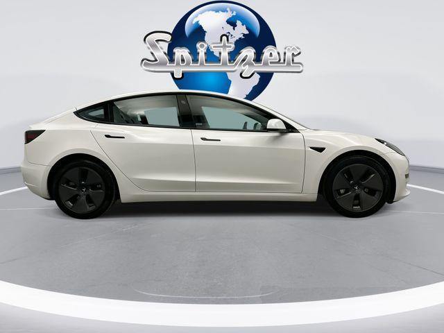 used 2023 Tesla Model 3 car, priced at $20,955