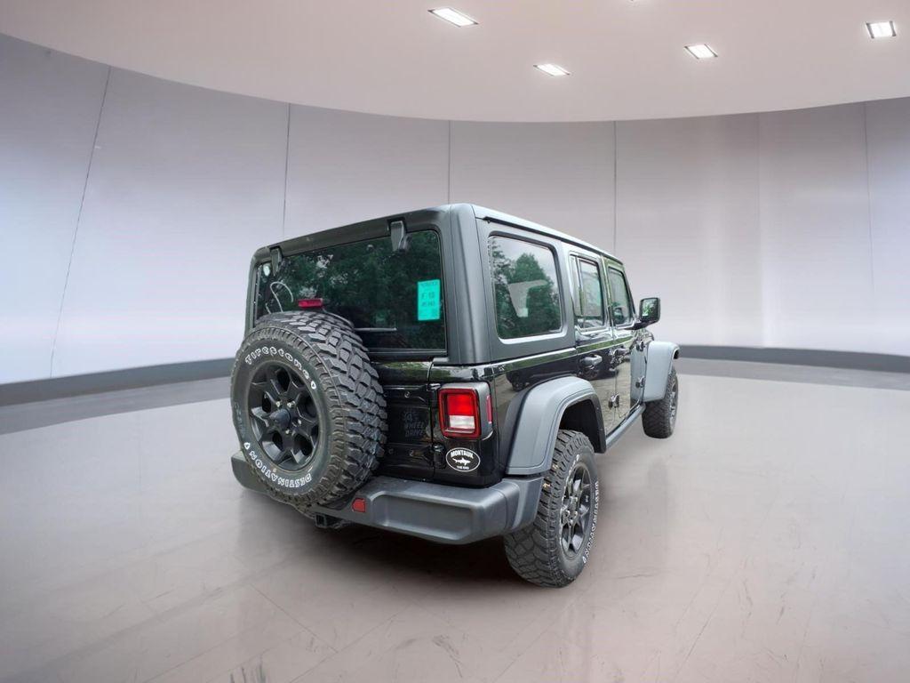 used 2023 Jeep Wrangler 4xe car, priced at $24,994