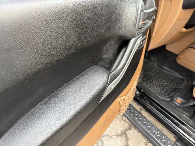 used 2013 Jeep Wrangler Unlimited car, priced at $12,824