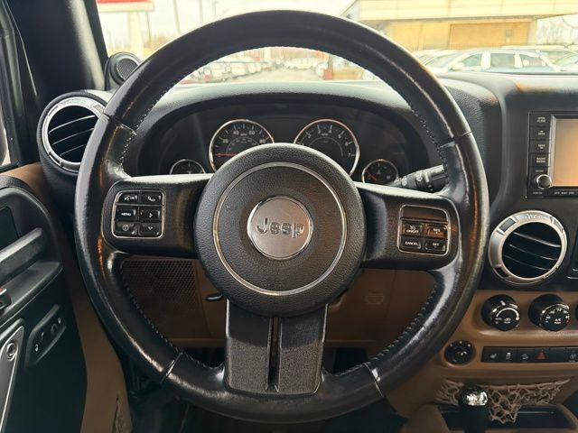 used 2013 Jeep Wrangler Unlimited car, priced at $12,824