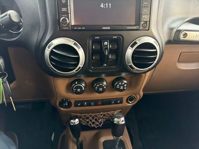 used 2013 Jeep Wrangler Unlimited car, priced at $12,824