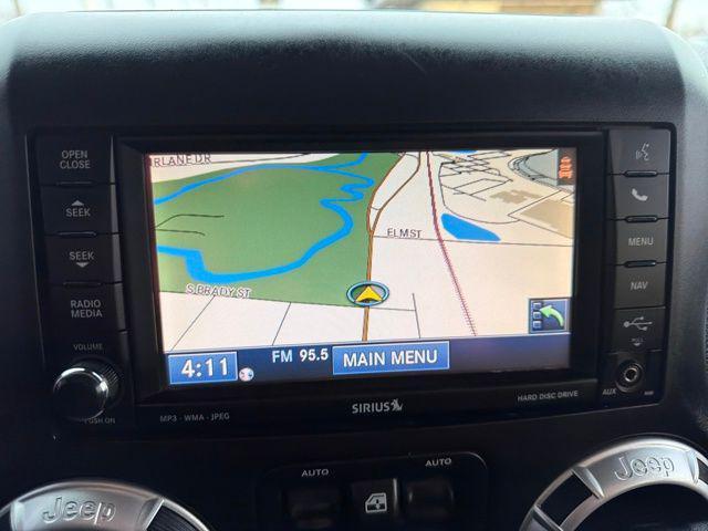 used 2013 Jeep Wrangler Unlimited car, priced at $12,824