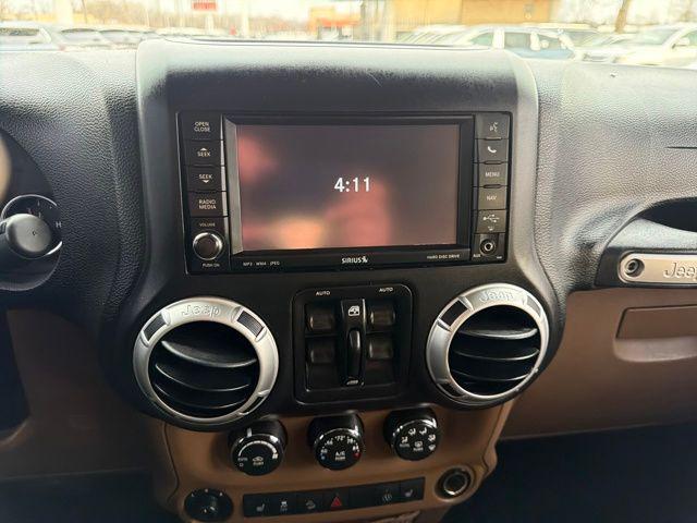 used 2013 Jeep Wrangler Unlimited car, priced at $12,824