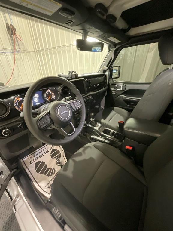 used 2023 Jeep Wrangler car, priced at $22,990