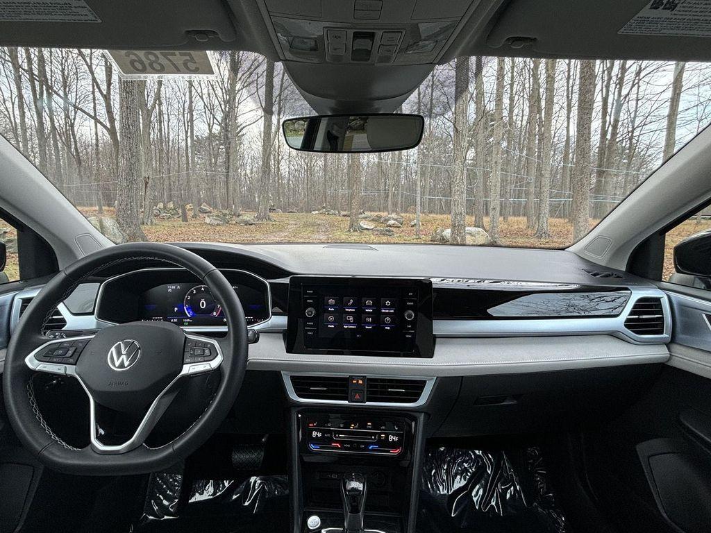 used 2025 Volkswagen Taos car, priced at $26,495