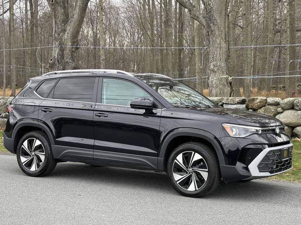used 2025 Volkswagen Taos car, priced at $26,495