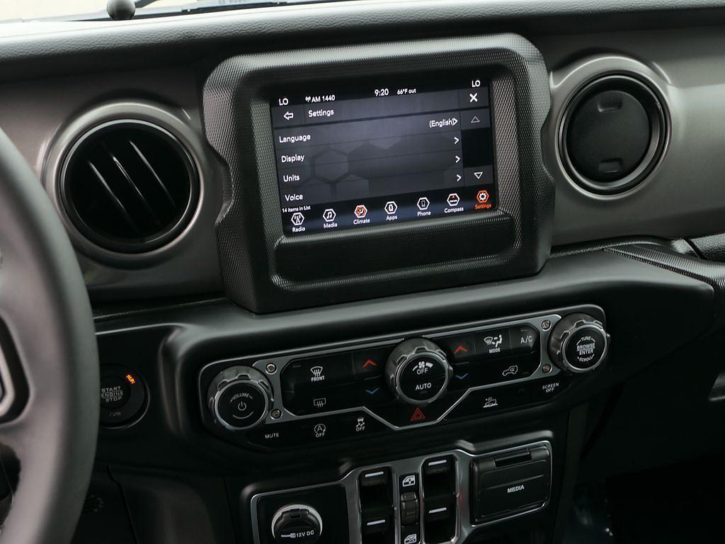 used 2023 Jeep Wrangler car, priced at $30,872