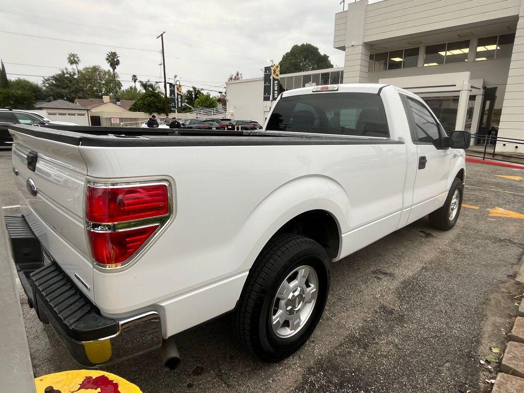 used 2014 Ford F-150 car, priced at $12,000
