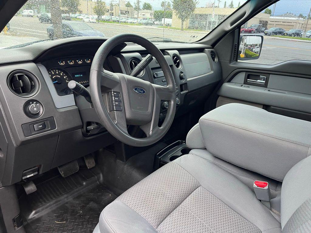 used 2014 Ford F-150 car, priced at $12,000