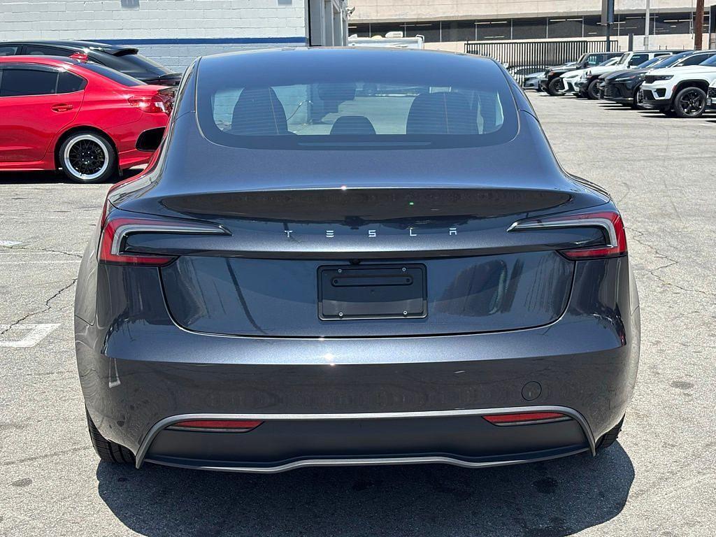 used 2025 Tesla Model 3 car, priced at $35,622
