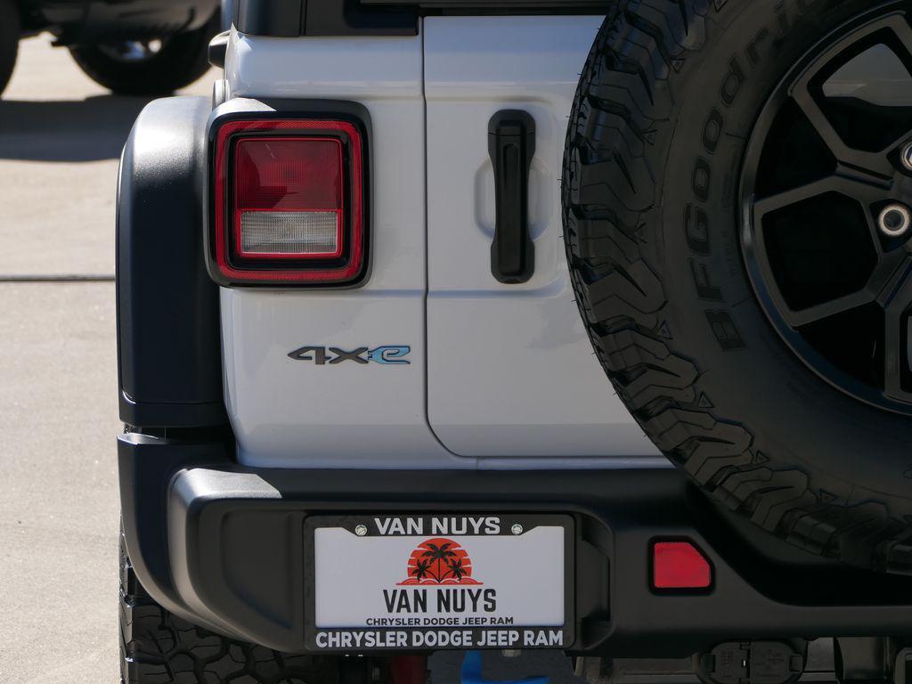 used 2024 Jeep Wrangler 4xe car, priced at $31,000