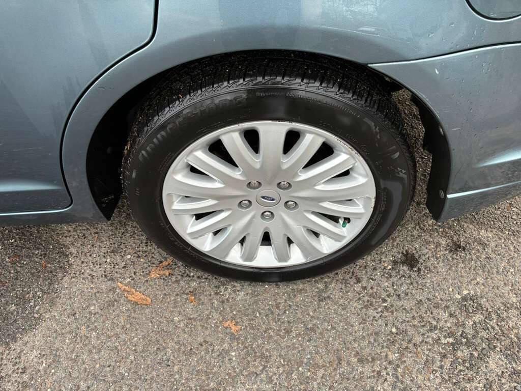 used 2012 Ford Fusion Hybrid car, priced at $4,500