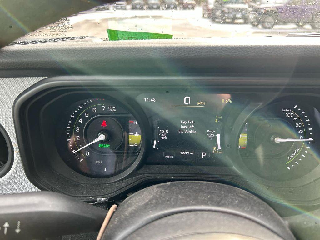 used 2024 Jeep Wrangler 4xe car, priced at $33,675