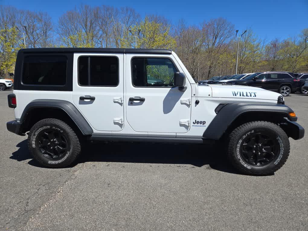 used 2023 Jeep Wrangler 4xe car, priced at $27,475