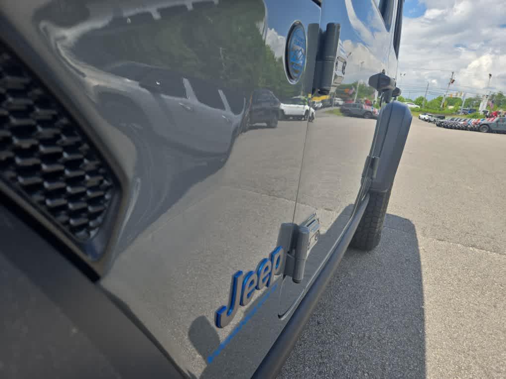 used 2023 Jeep Wrangler 4xe car, priced at $29,475