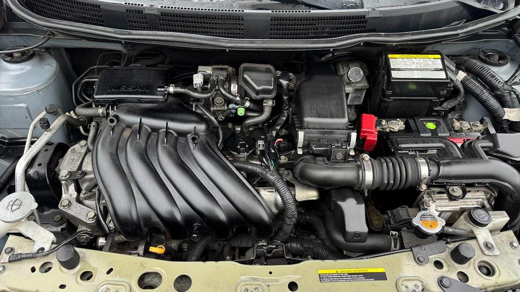 used 2013 Nissan Versa car, priced at $4,999