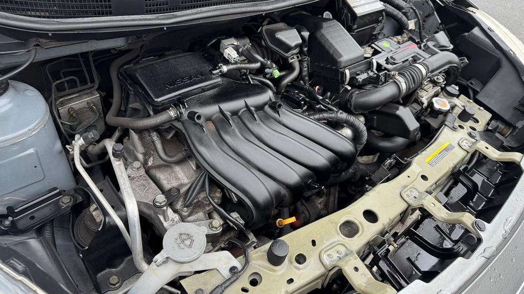 used 2013 Nissan Versa car, priced at $4,999