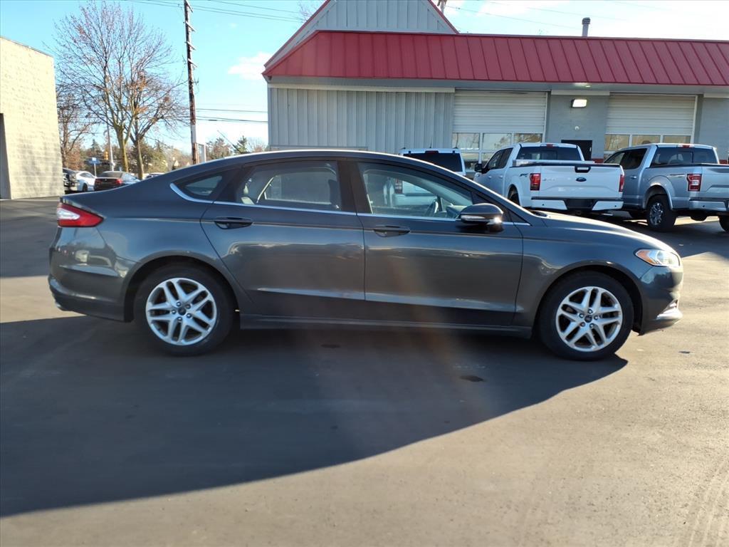used 2016 Ford Fusion car, priced at $5,995