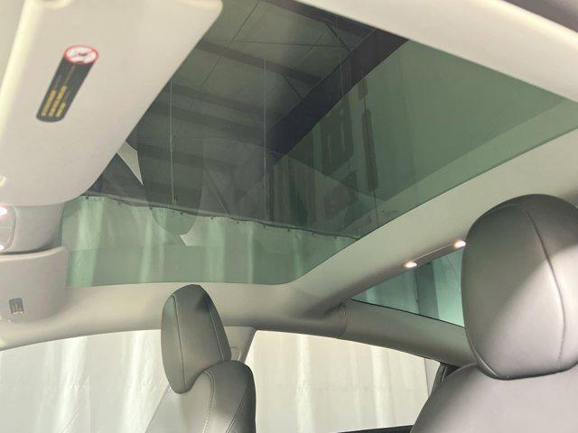 used 2023 Tesla Model 3 car, priced at $30,000